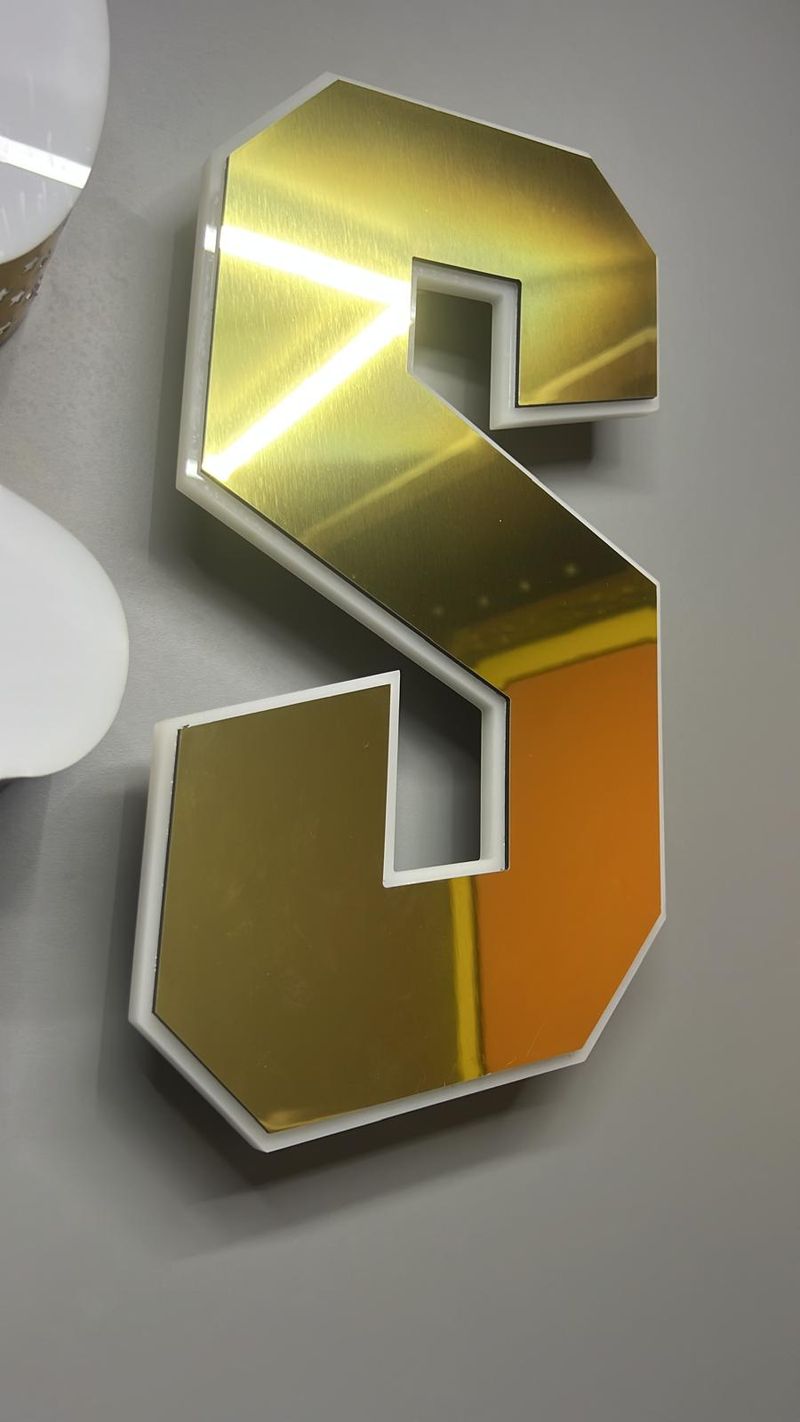 Polished gold fabricated 3D letter S
