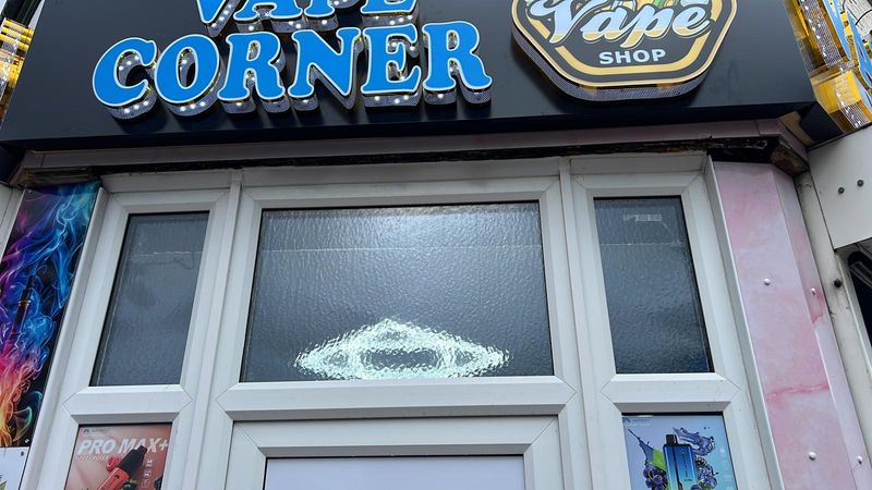 Blue illuminated Vape Corner shopfront fascia