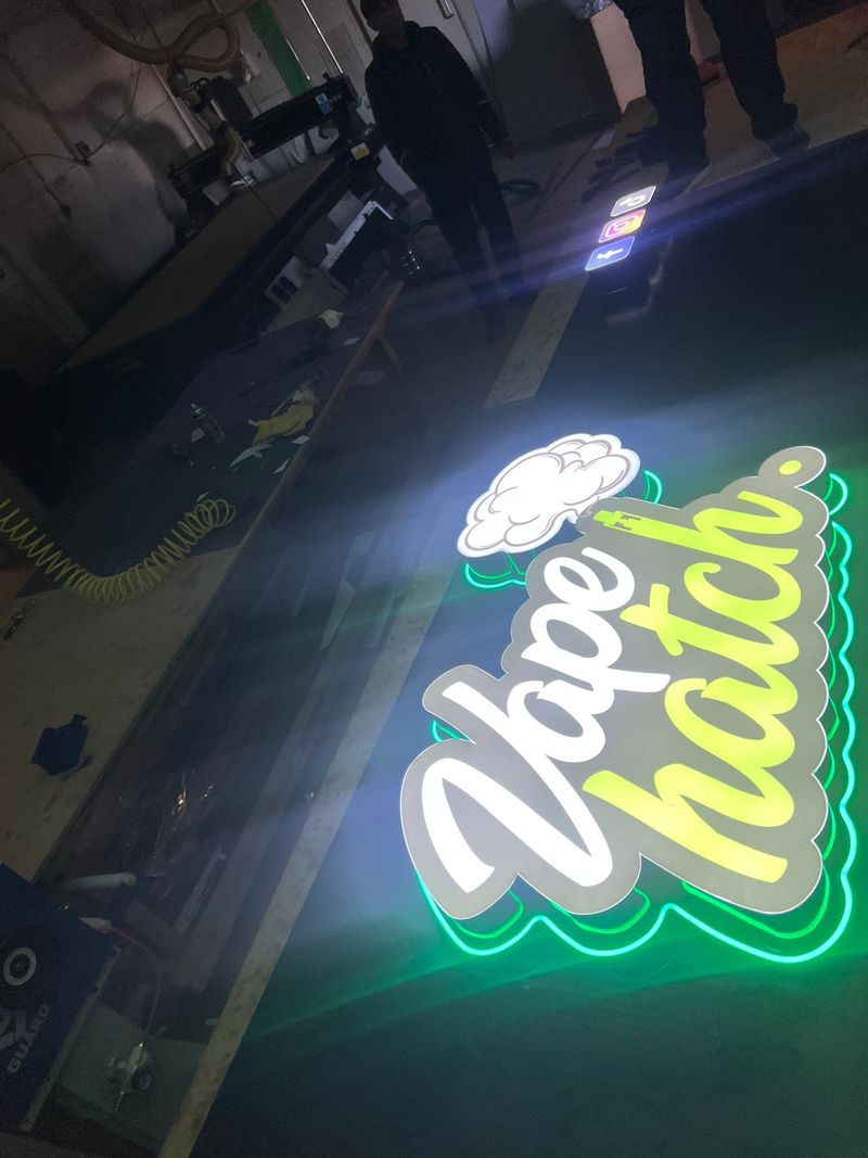 Green and white Vape Hatch LED neon sign